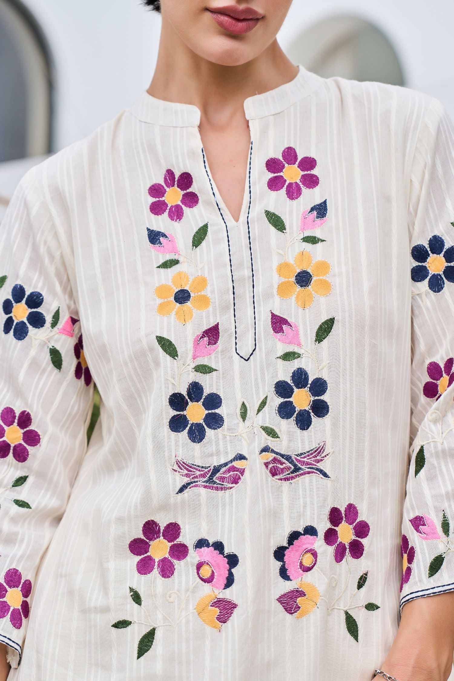 Off-White Cord Set Featuring Small Thread Work Flowers and Solid Pants