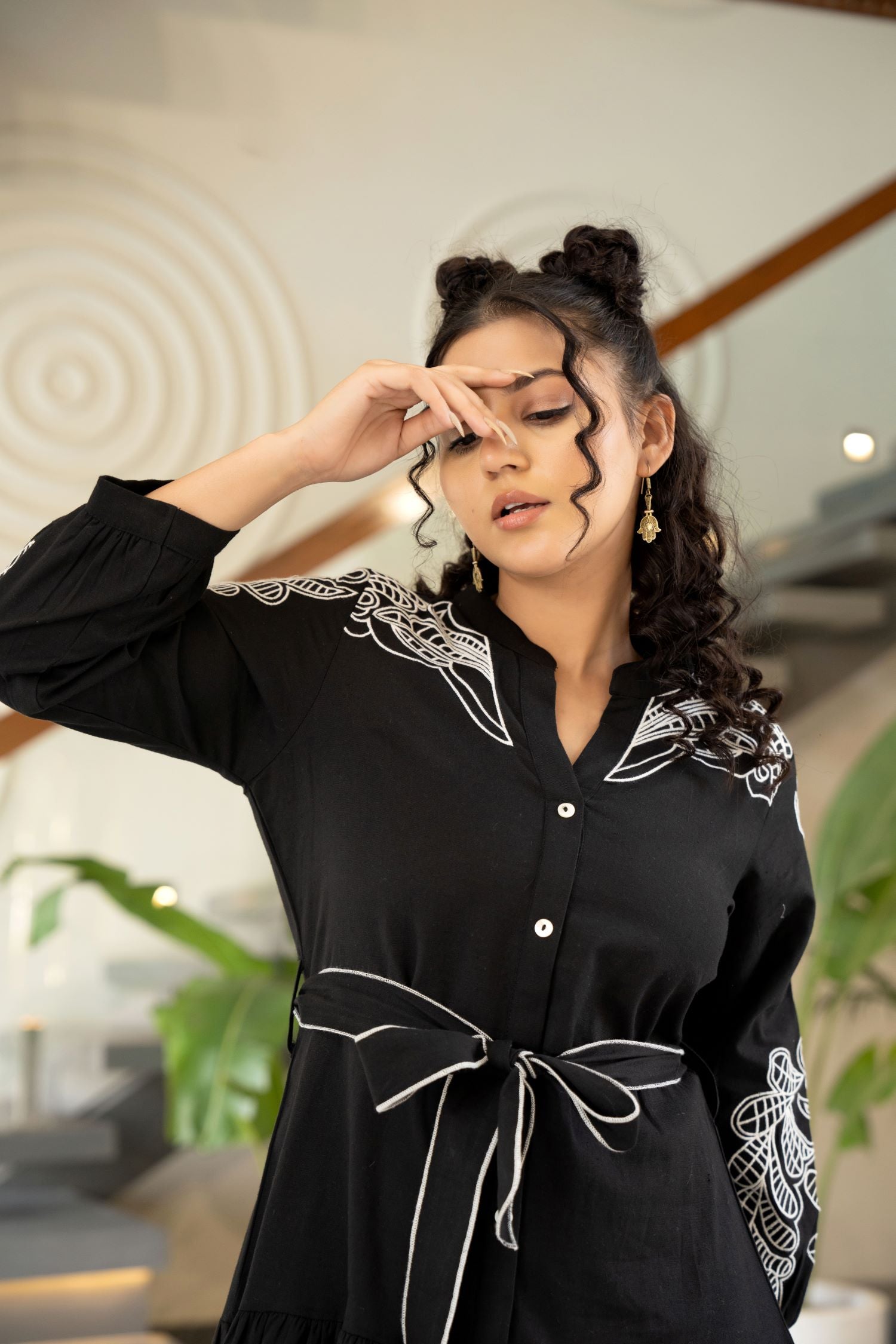 Chic Tunic with Intricate Designs and Flattering Belt