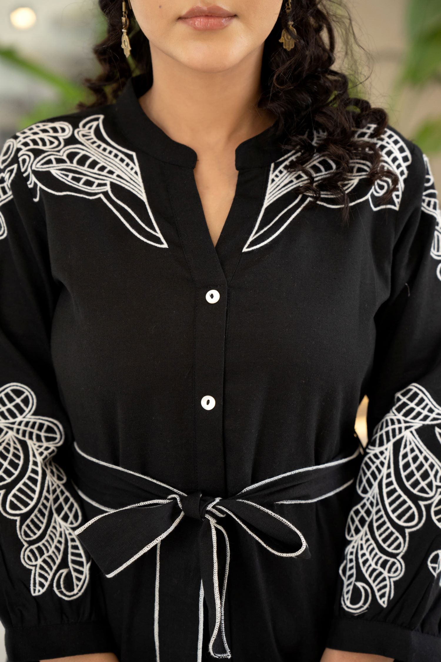Chic Tunic with Intricate Designs and Flattering Belt