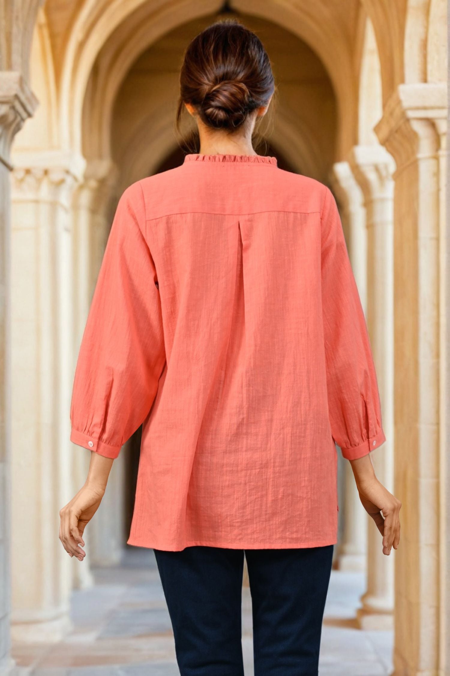 Bright Bloom Orange Top with Subtle Detailing