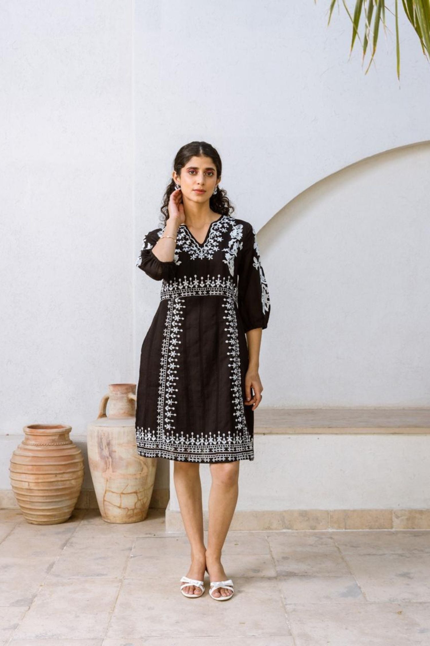 Stunning Black Tunic with Artistic Detail