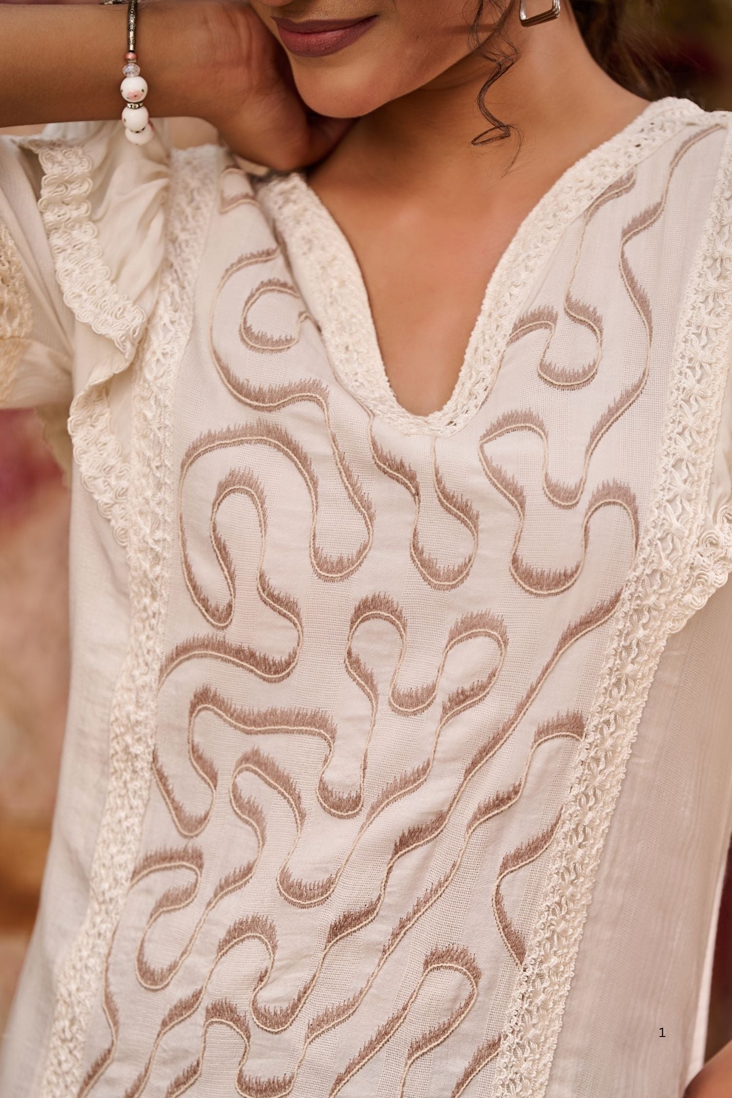 Off-White Tunic with Golden Curves