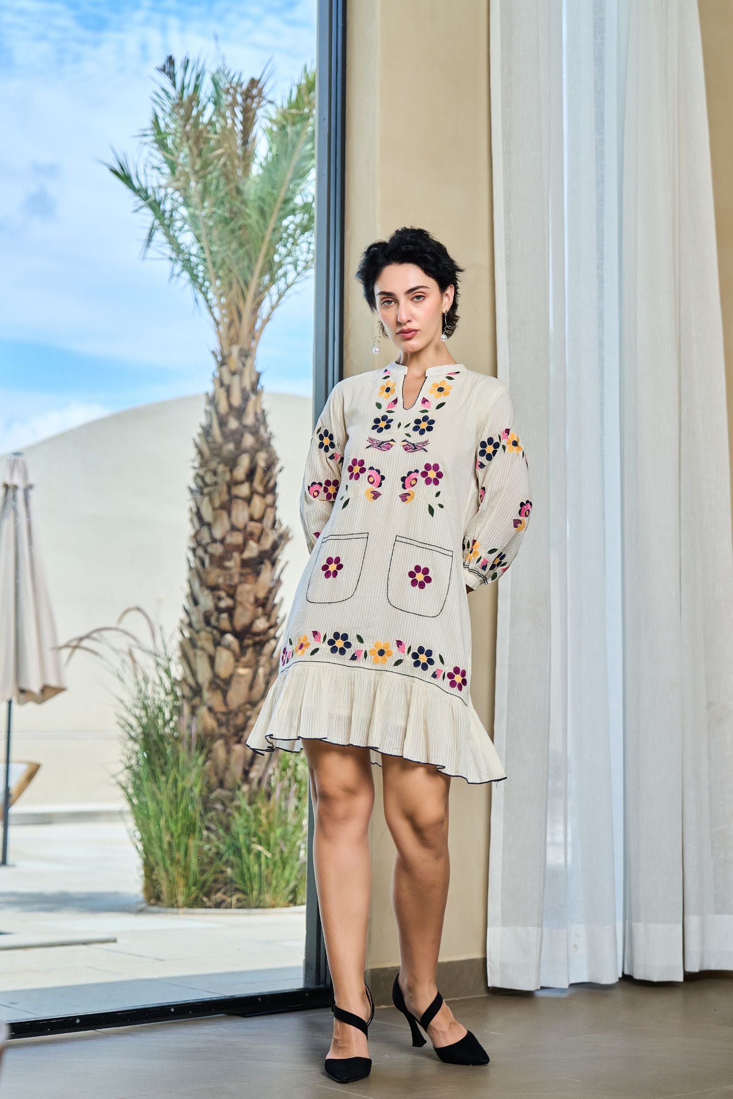 Off-White Tunic with Graceful Floral Print Detailing