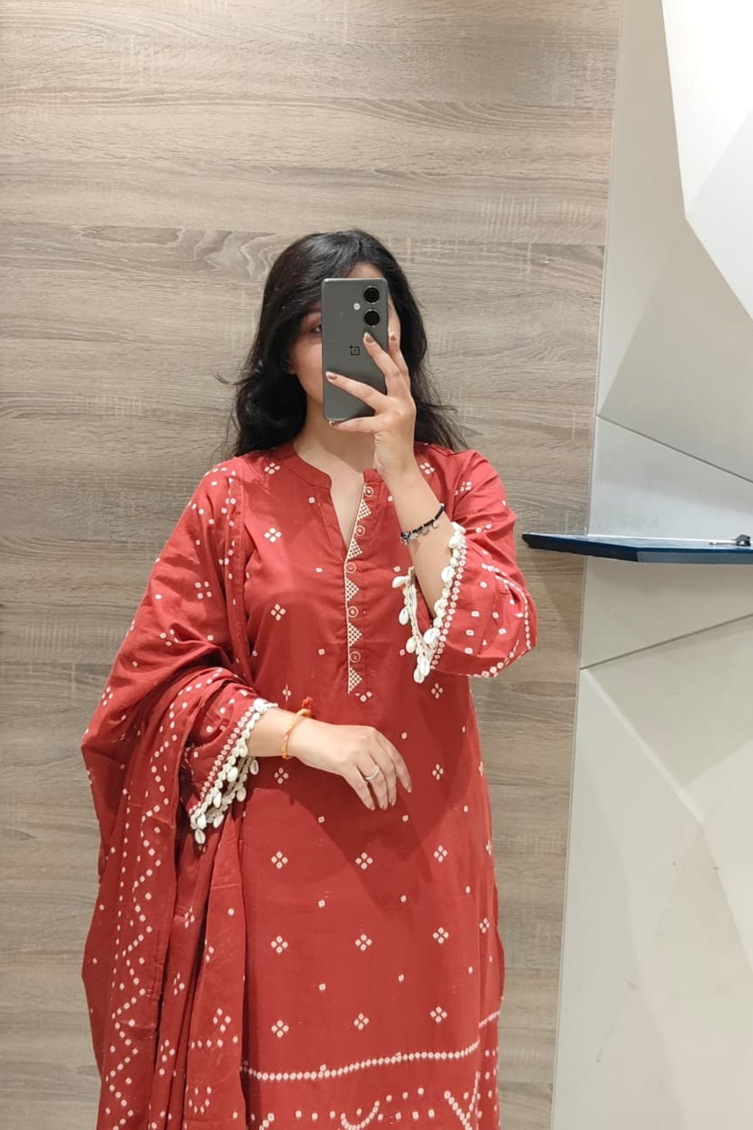 Red Three-Piece Suit with Dupatta and Delicate Kodiya on Sleeves